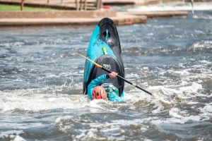Tailee in a Pyranha Ozone at HPP, Nottingham, whitewater kayaking