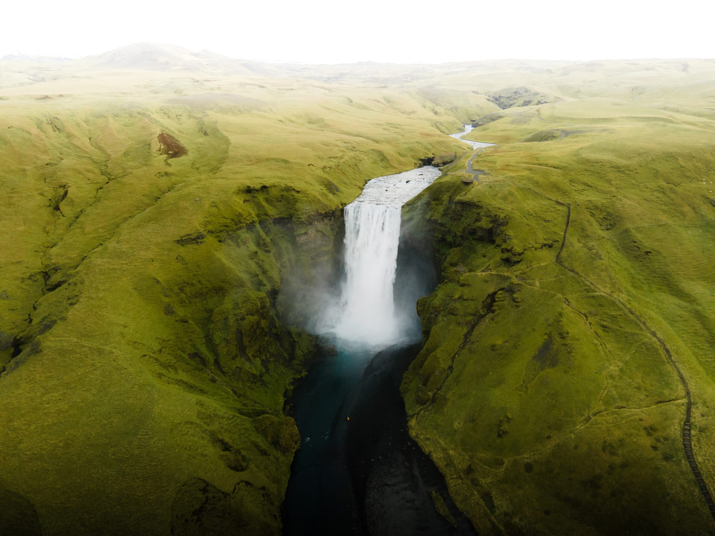 Iceland waterfall from a drone, birds eye view